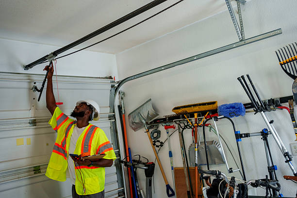 Professional Garage Door Installation technician working in East Oakdale, CA